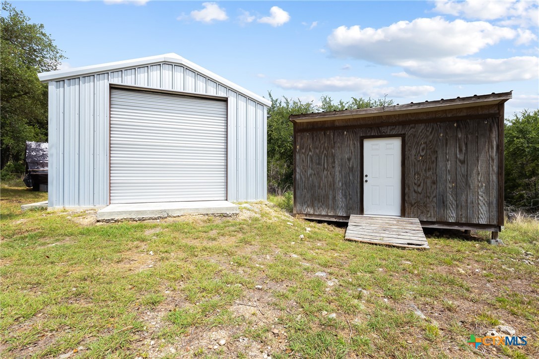 700 Camino De Rancho Wimberley, TX 78676 - Photo 6 of 41 a view of wooden house with a yard
