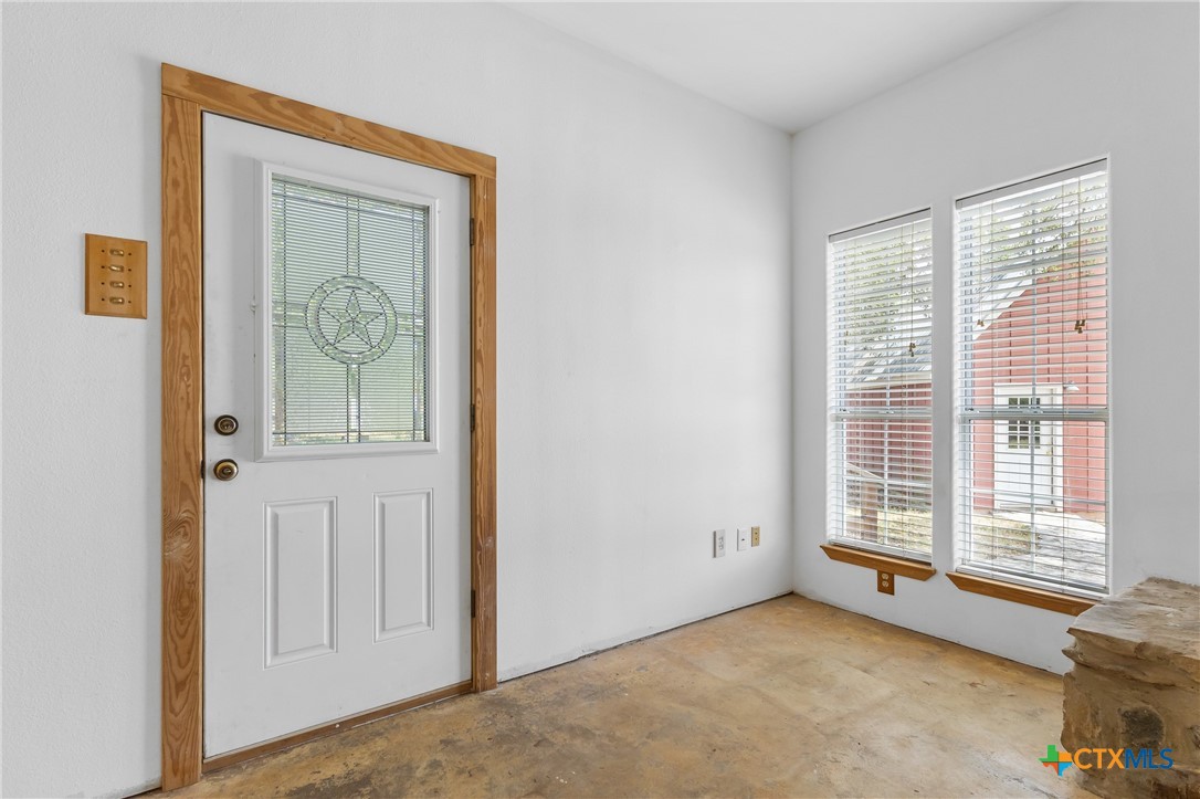 700 Camino De Rancho Wimberley, TX 78676 - Photo 8 of 41 a view of an empty room with a window