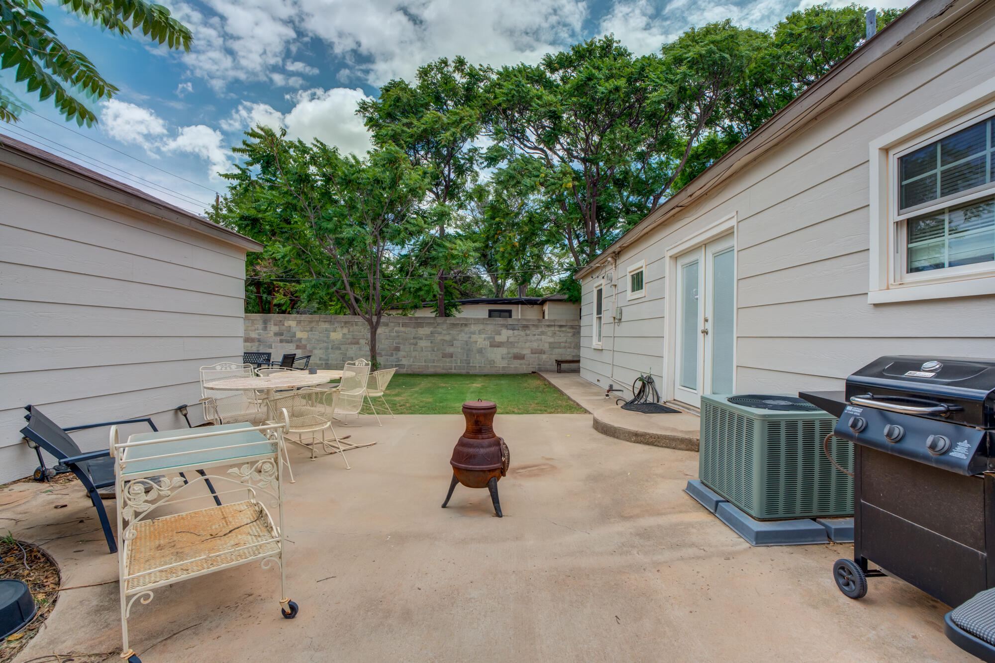 2826 33rd Street Lubbock, TX 79410 - Photo 26 of 33 a view of backyard with seating space