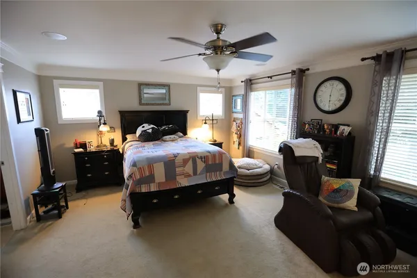 a bed room with furniture and a window