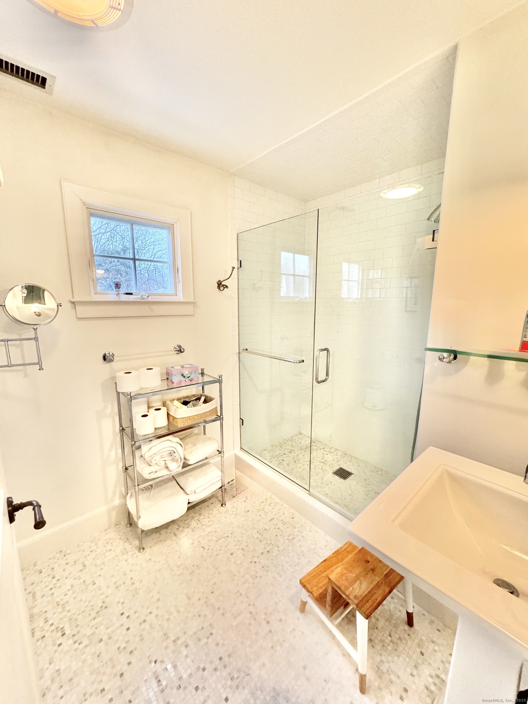 9 Barclay Court Norwalk, CT 06853 - Photo 14 of 16 a bathroom with a tub and shower