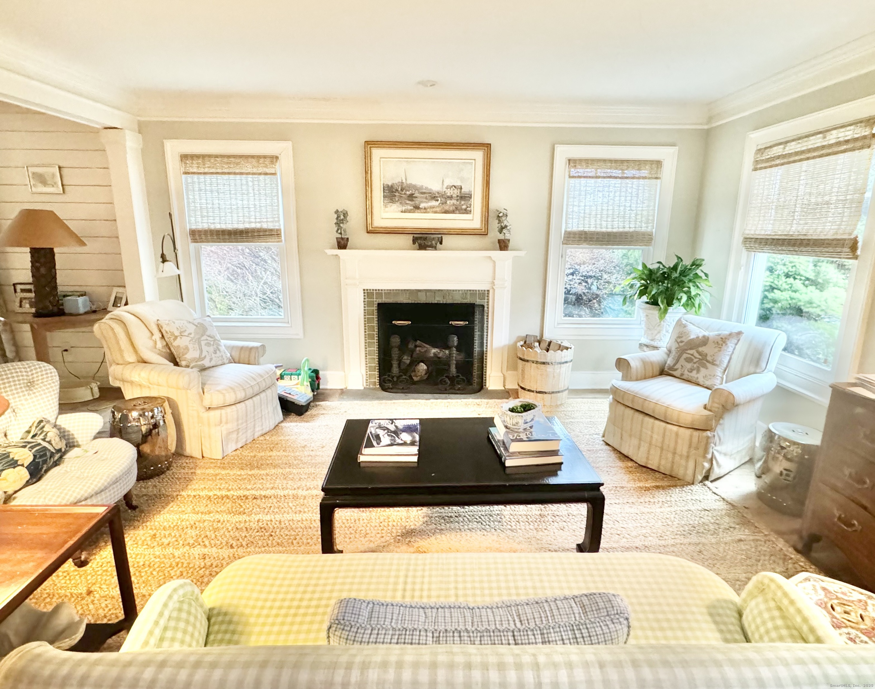 9 Barclay Court Norwalk, CT 06853 - Photo 5 of 16 a living room with furniture and a fireplace