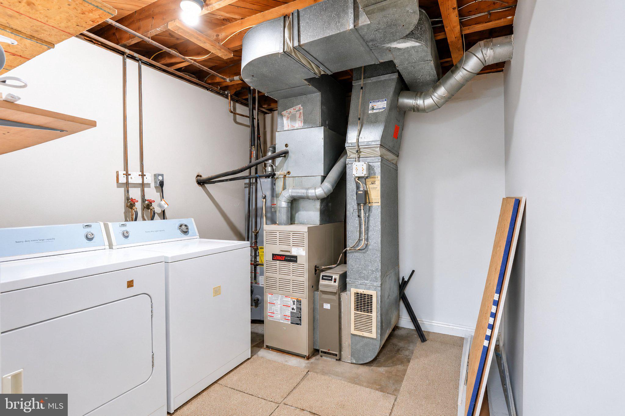 5712 Ash Drive Springfield, VA 22150 - Photo 27 of 38 Functional laundry and utility space.