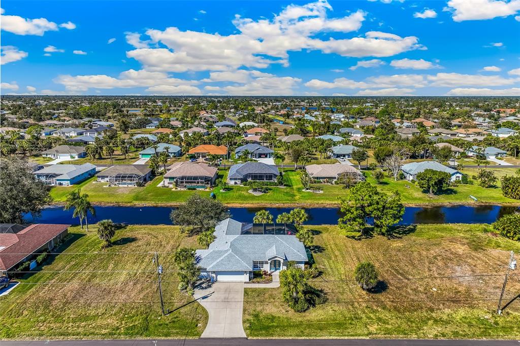 57 Marker Road Rotonda West, FL 33947 - Photo 21 of 27 an aerial view of residential houses with outdoor space