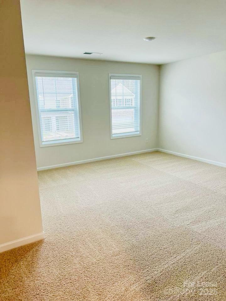 7870 Iron Road Sherrills Ford, NC 28673 - Photo 19 of 22 an empty room with windows
