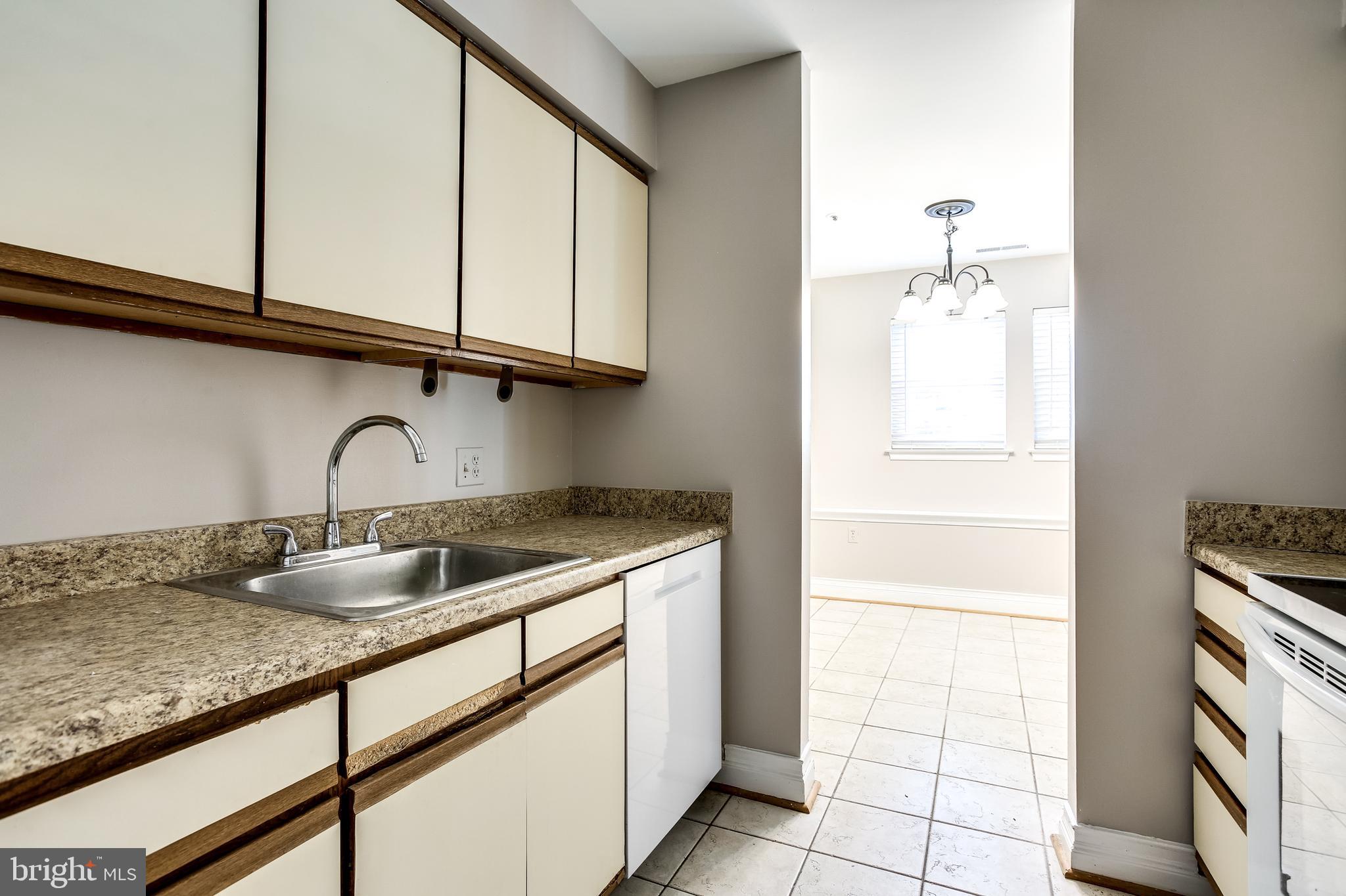 8384 Montgomery Run Road, Unit A Ellicott City, MD 21043 - Photo 11 of 29 Kitchen with plenty of cabinets