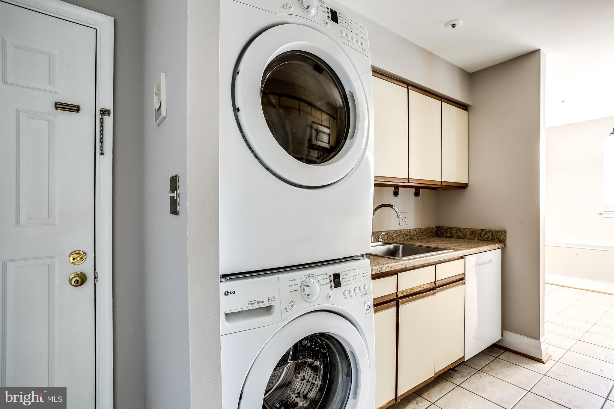 8384 Montgomery Run Road, Unit A Ellicott City, MD 21043 - Photo 12 of 29 Kitchen & In-Unit Laundry Area