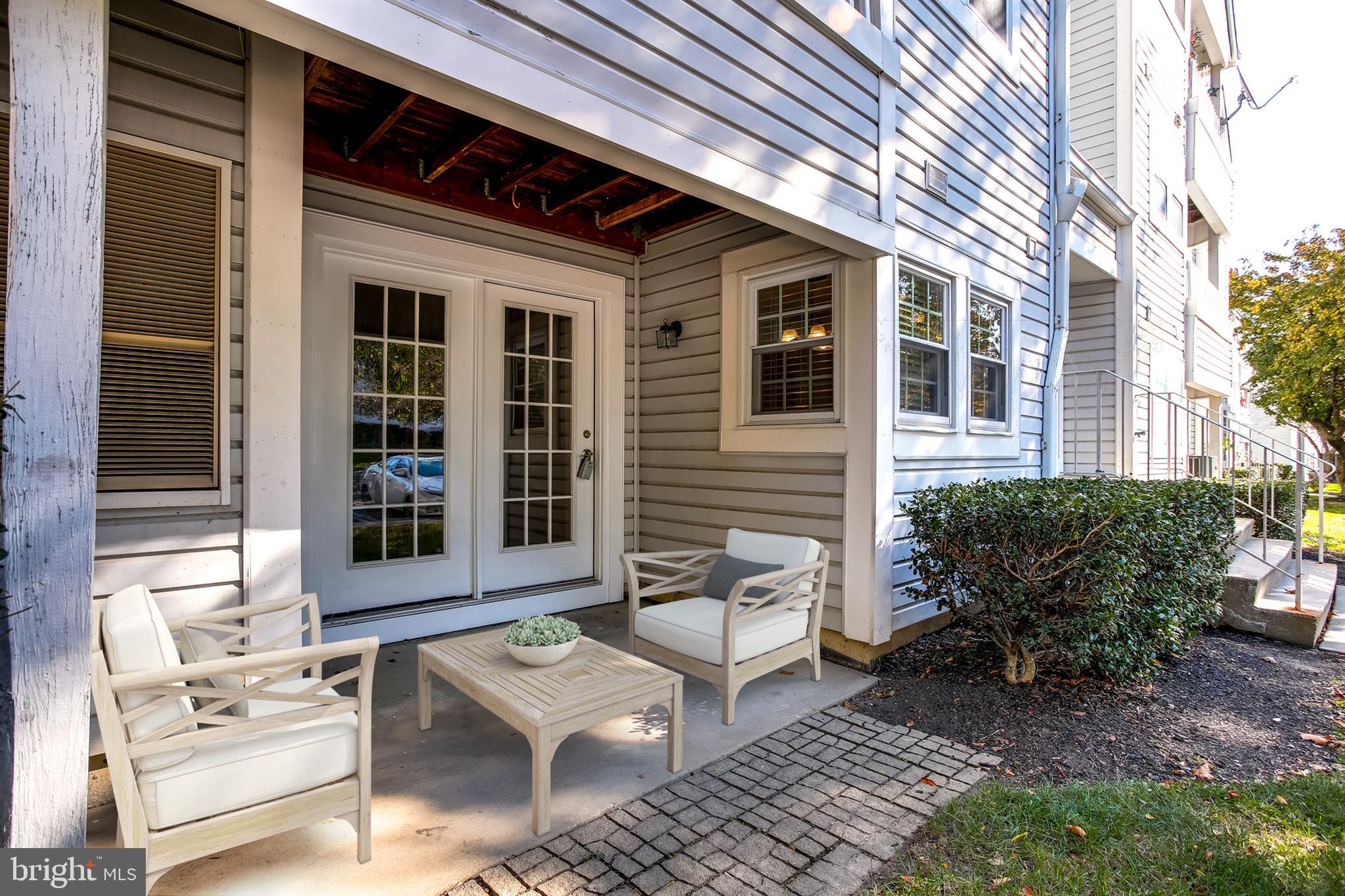 8384 Montgomery Run Road, Unit A Ellicott City, MD 21043 - Photo 27 of 29 Main level unit with patio-virtually staged