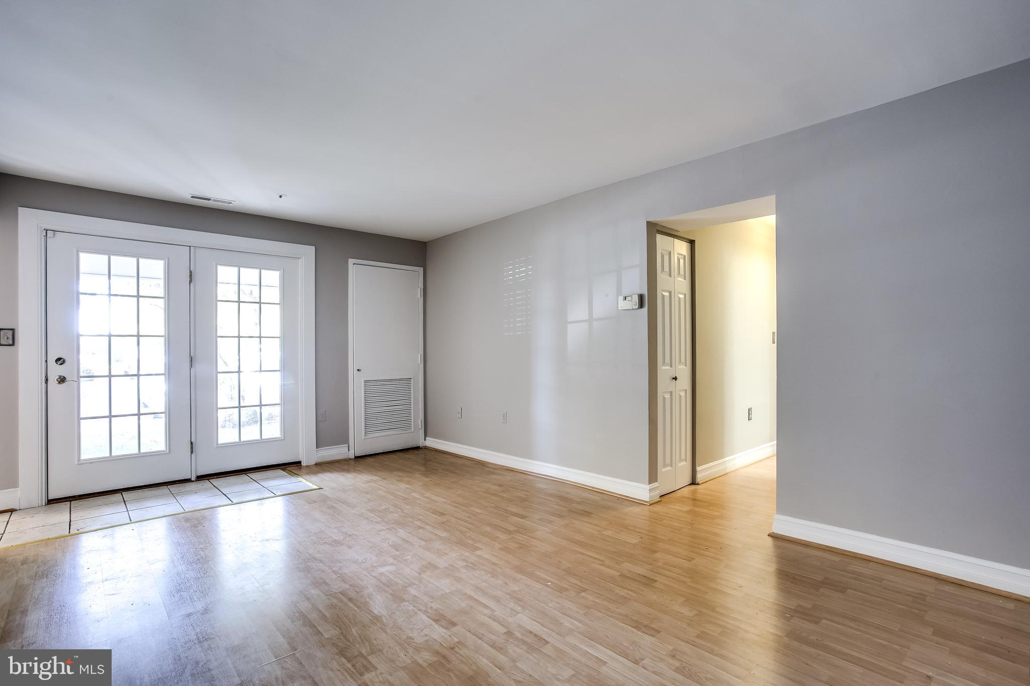 8384 Montgomery Run Road, Unit A Ellicott City, MD 21043 - Photo 4 of 29 Sun-Filled Living Room