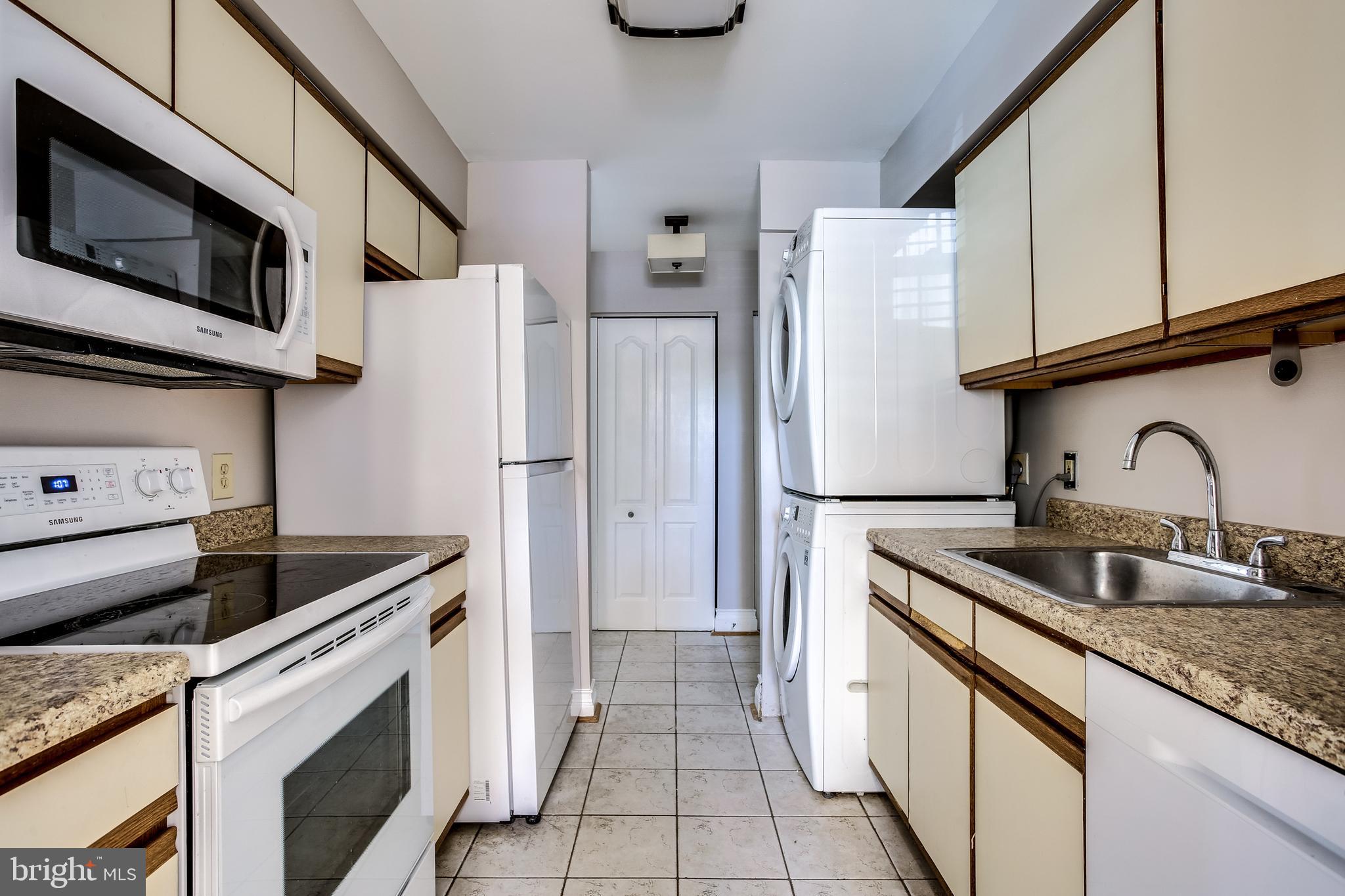 8384 Montgomery Run Road, Unit A Ellicott City, MD 21043 - Photo 9 of 29 Galley-style kitchen for cooking efficiency