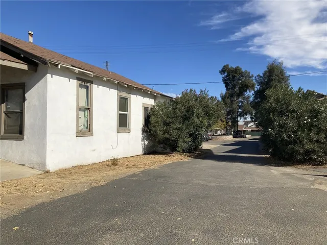 a view of a house with a street