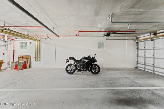 a view of a garage with storage