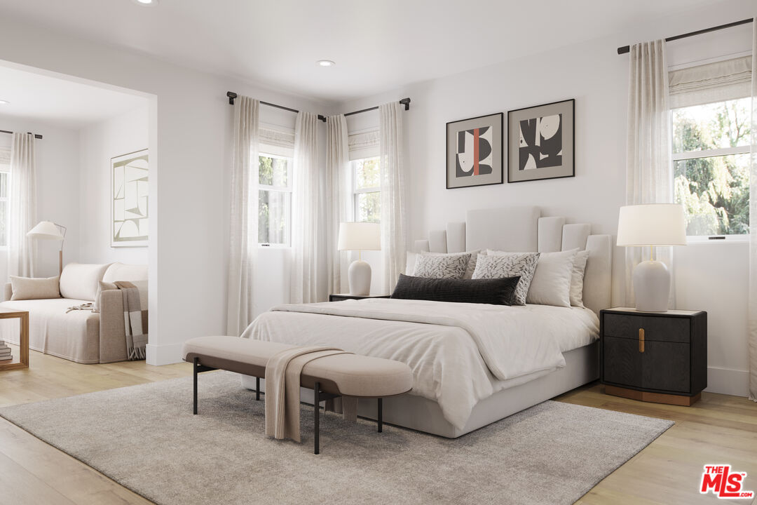 2807 Cardiff Avenue Los Angeles, CA 90034 - Photo 6 of 11 a bedroom with a bed and a couch