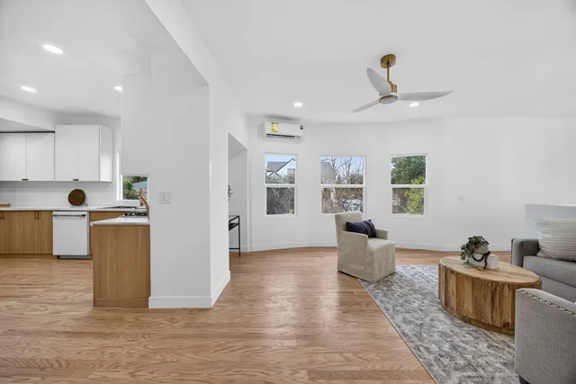 a view of a kitchen and dining room