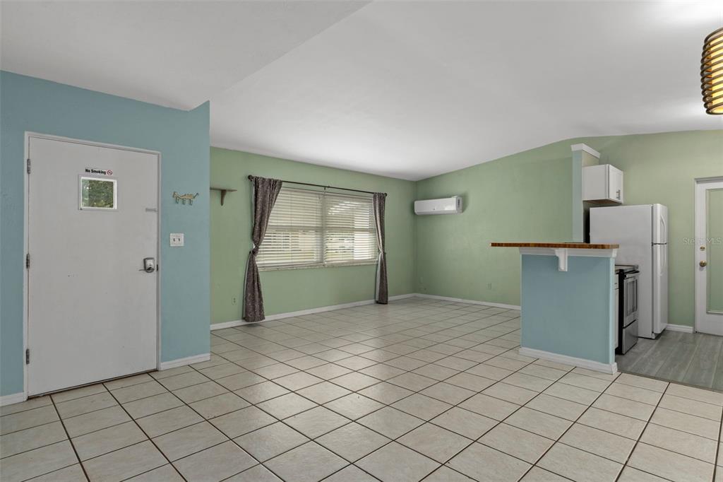 6421 Finance Avenue Weeki Wachee, FL 34607 - Photo 15 of 38 a view of a room & utility room