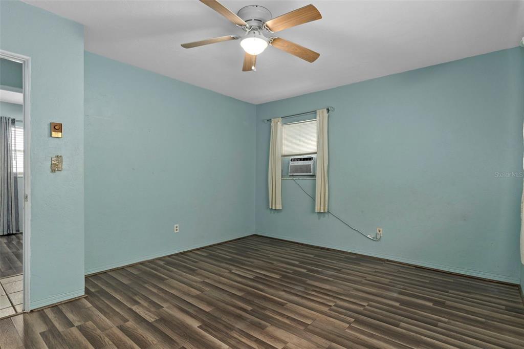 6421 Finance Avenue Weeki Wachee, FL 34607 - Photo 26 of 38 wooden floor in an empty room