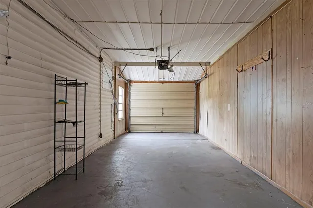a view of a swimming pool with outdoor seating space