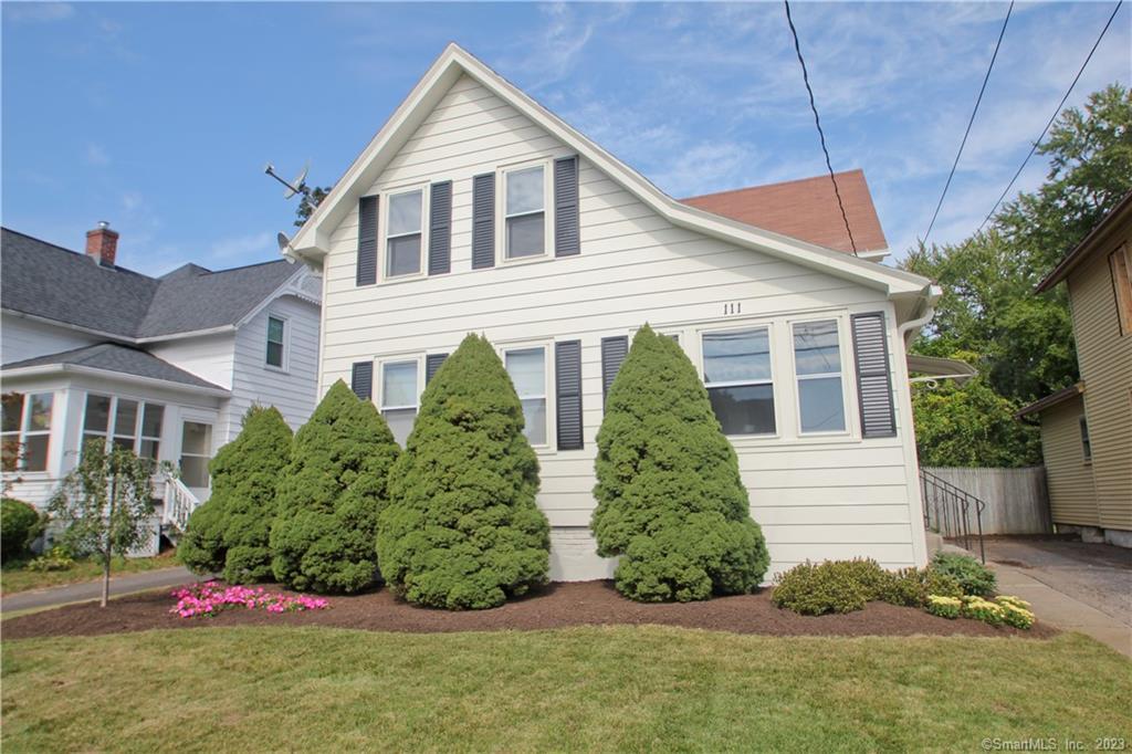 111 Spring Street Windsor Locks, CT 06096 - Photo 1 of 1 a front view of a house with a yard