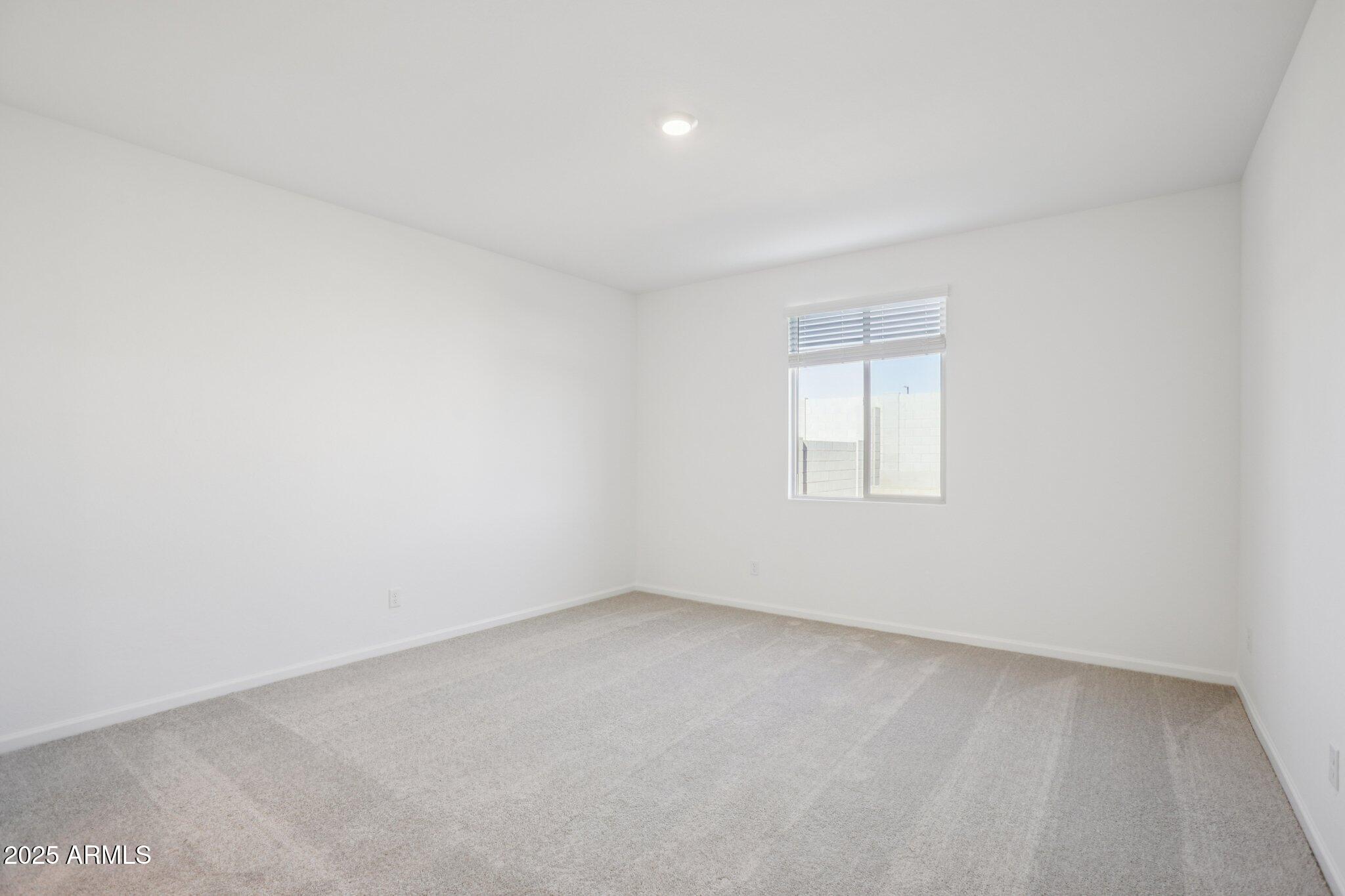 16226 West Bajada Road Surprise, AZ 85387 - Photo 25 of 45 an empty room with a window