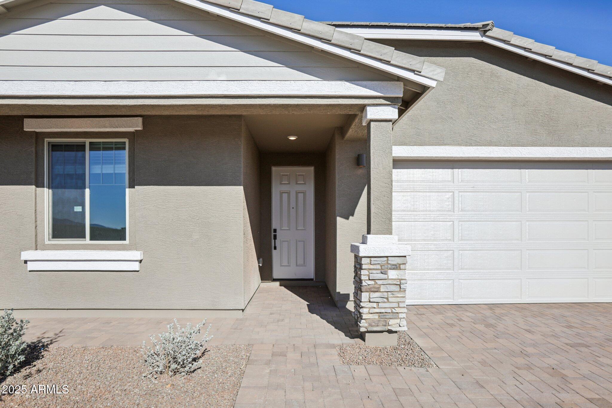 16226 West Bajada Road Surprise, AZ 85387 - Photo 4 of 45 a view of the house with a small space