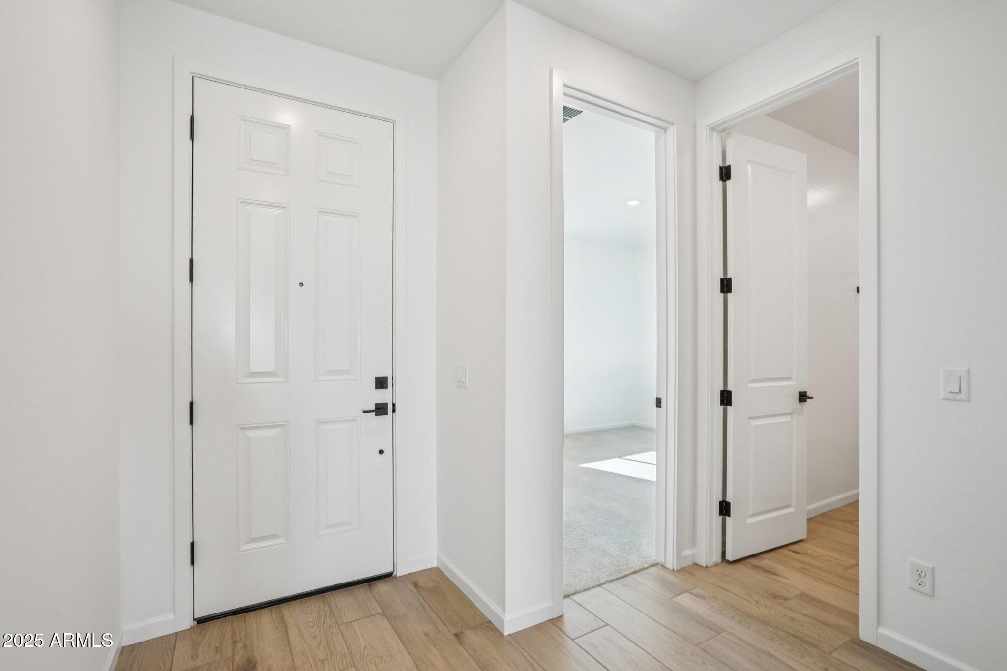 16226 West Bajada Road Surprise, AZ 85387 - Photo 5 of 45 a view of a bathroom with wooden floor