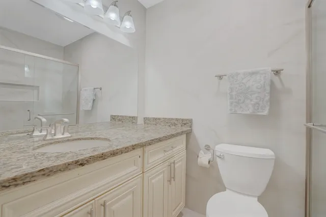 a view of a balcony with furniture