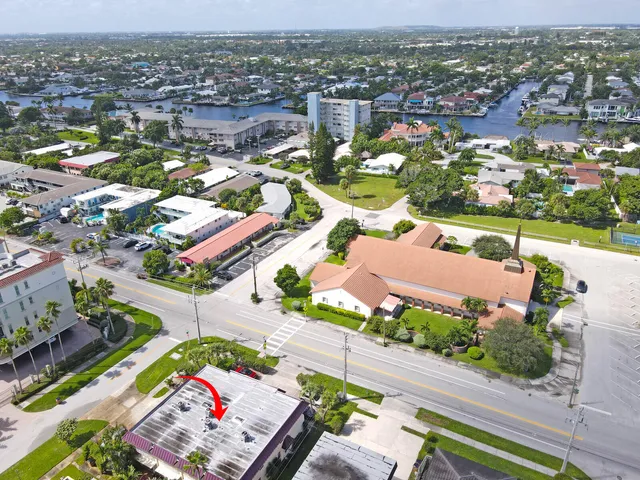 a view of a city with an ocean view