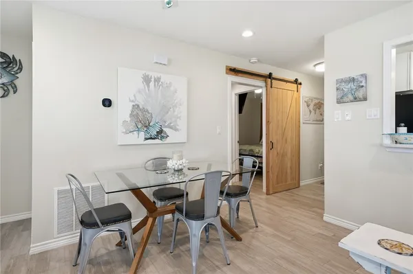a bathroom with a shower curtain and a curtain