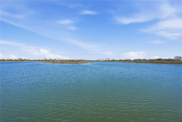 a room with furniture a flat screen tv and a fireplace