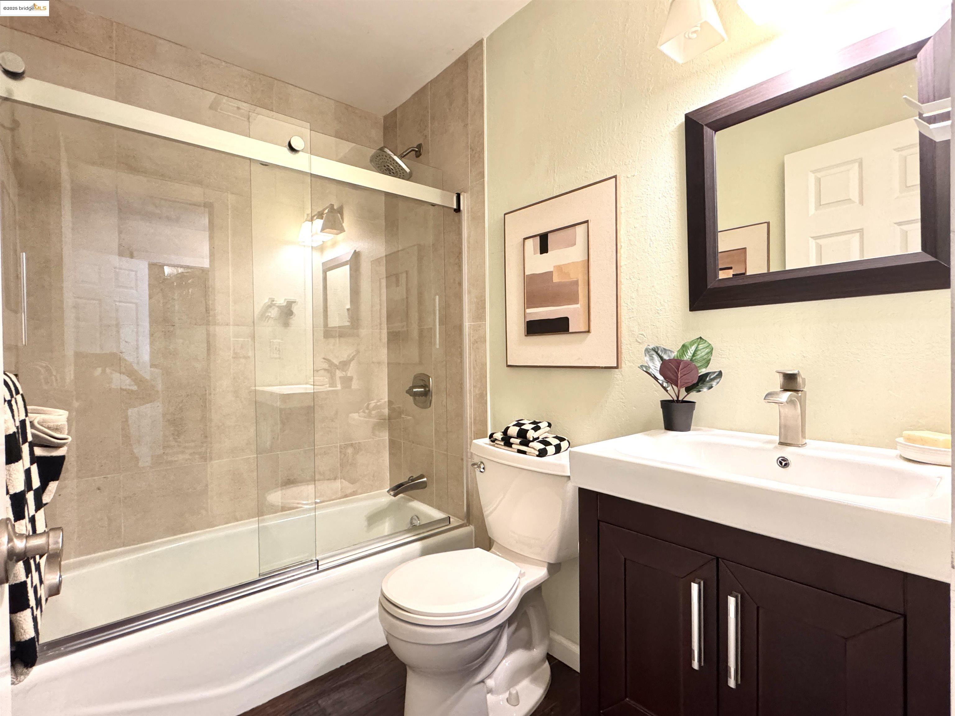 3365 Los Prados Street San Mateo, CA 94403 - Photo 15 of 47 a bathroom with a sink and a mirror