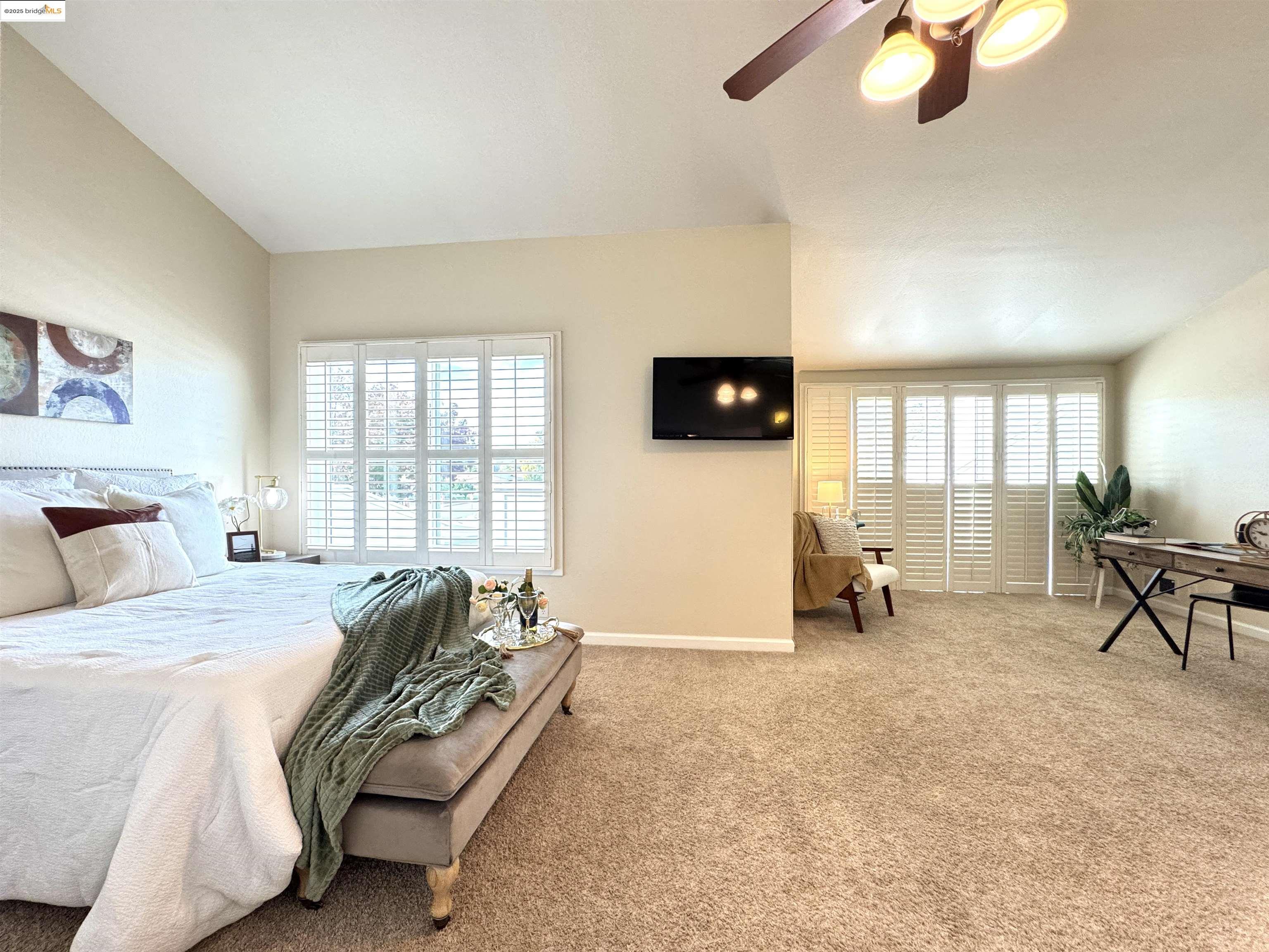 3365 Los Prados Street San Mateo, CA 94403 - Photo 18 of 47 a spacious bedroom with a bed and a television