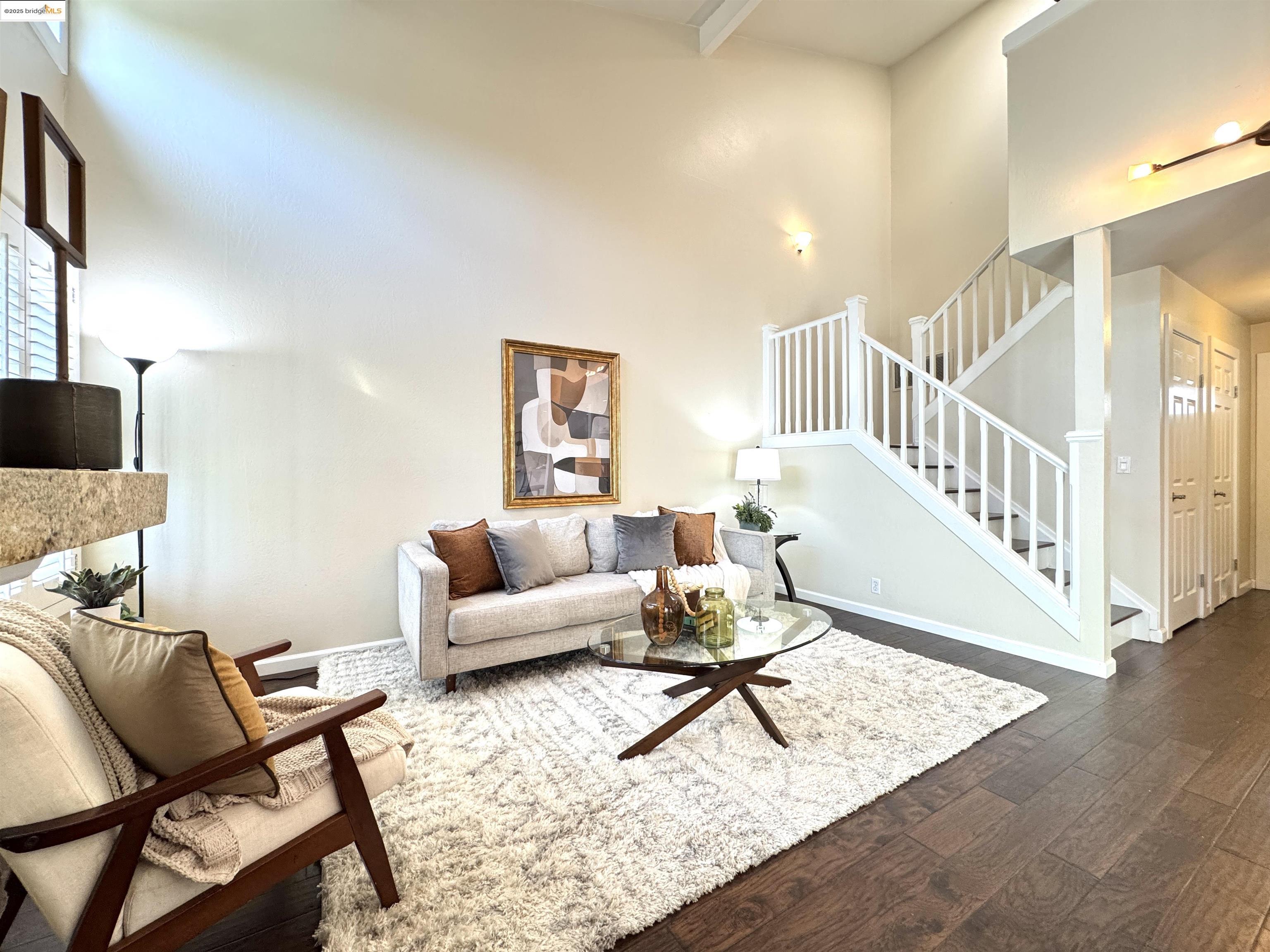 3365 Los Prados Street San Mateo, CA 94403 - Photo 5 of 47 a living room with furniture and wooden floor