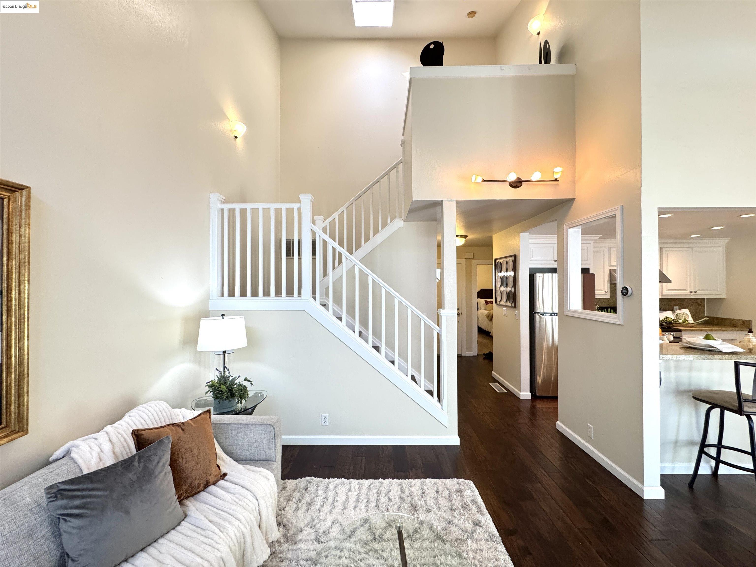 3365 Los Prados Street San Mateo, CA 94403 - Photo 6 of 47 a living room with furniture and a wooden floor