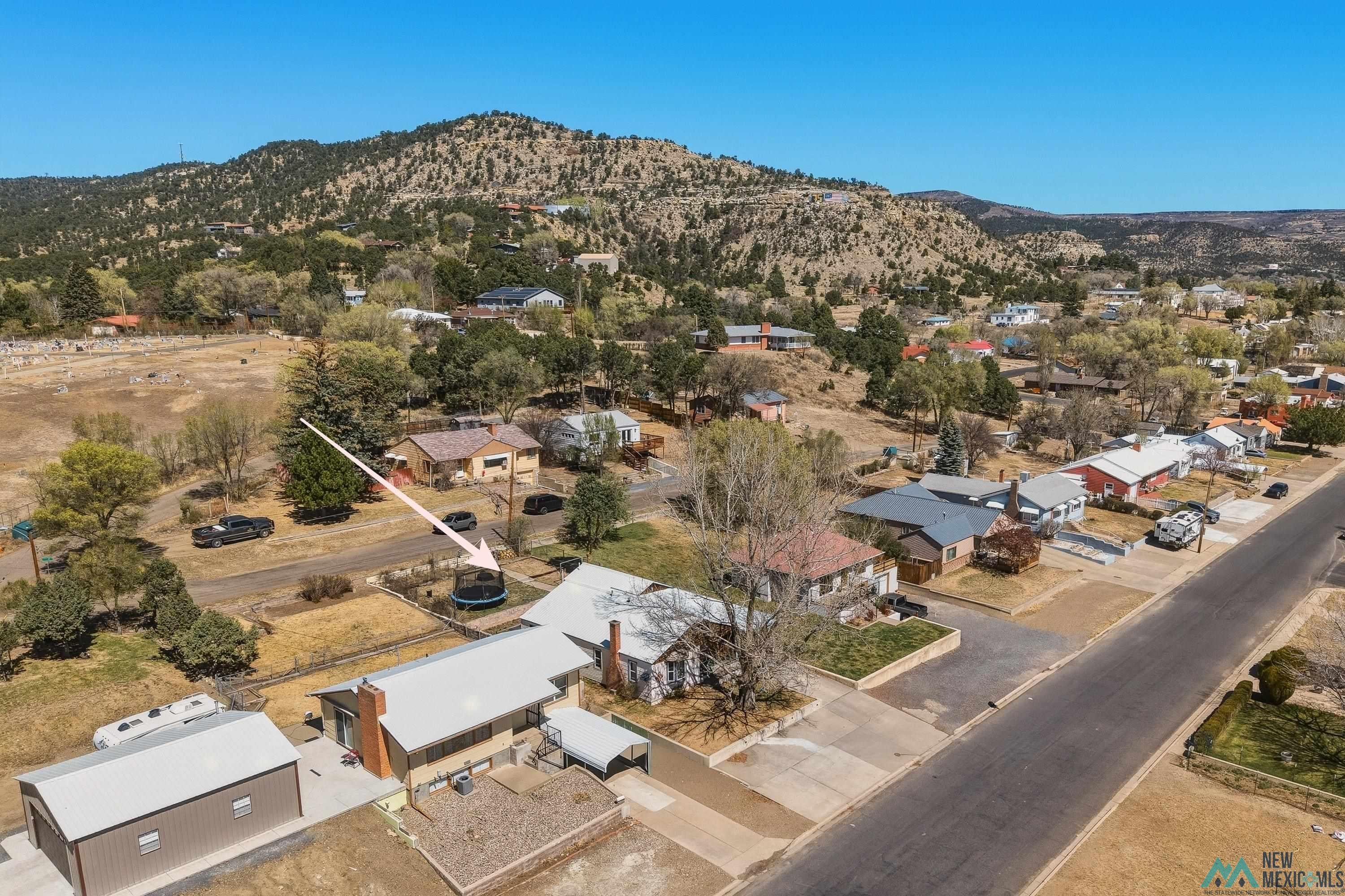 1432 South 5th Street Raton, NM 87740 - Photo 30 of 32 Aerial view of property's location featuring mountains and nearby suburban area