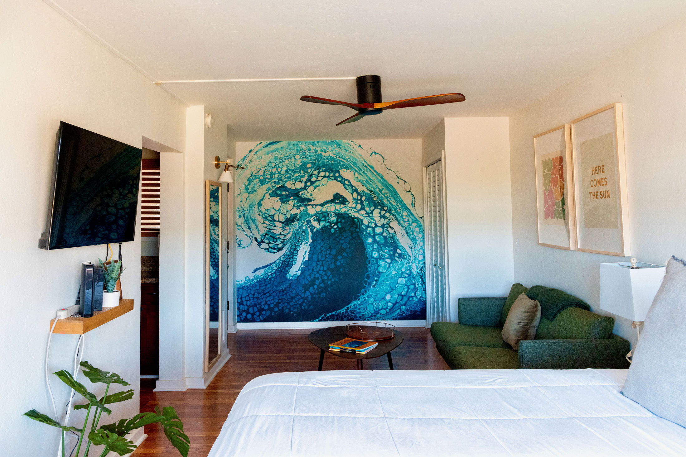 5061 Lawai Road, Unit 207 Koloa, HI 96756 - Photo 13 of 25 a bedroom with a bed and a flat screen tv