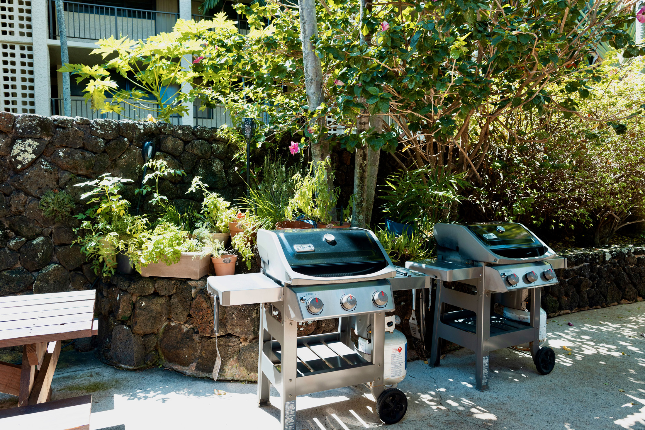 5061 Lawai Road, Unit 207 Koloa, HI 96756 - Photo 19 of 25 a couple of table and chairs in a patio