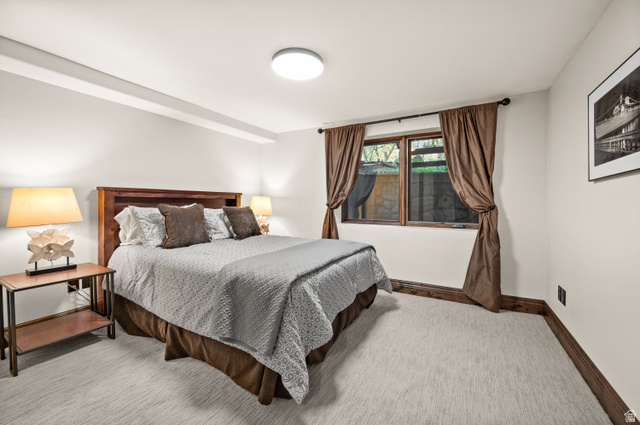 10280 Dimple Dell Road Sandy, UT 84092 - Photo 51 of 58 Bedroom with baseboards and light colored carpet