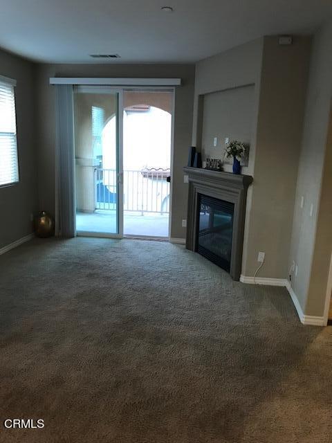 4635 Via Del Sol Camarillo, CA 93012 - Photo 6 of 16 a view of an empty room with a fireplace