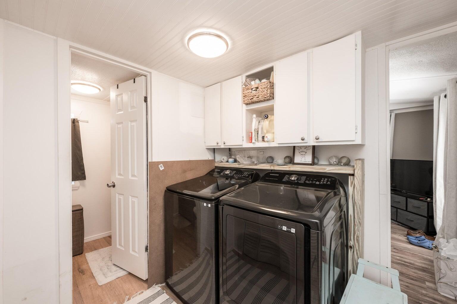 27942 Snapper Lane Summerland Key, FL 33042 - Photo 22 of 26 a kitchen with stainless steel appliances granite countertop a sink stove and refrigerator