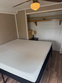 27942 Snapper Lane Summerland Key, FL 33042 - Photo 25 of 26 a bedroom with a bed and painting on the wall