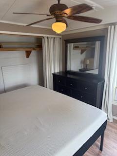 27942 Snapper Lane Summerland Key, FL 33042 - Photo 26 of 26 a bed room with a bed and dresser