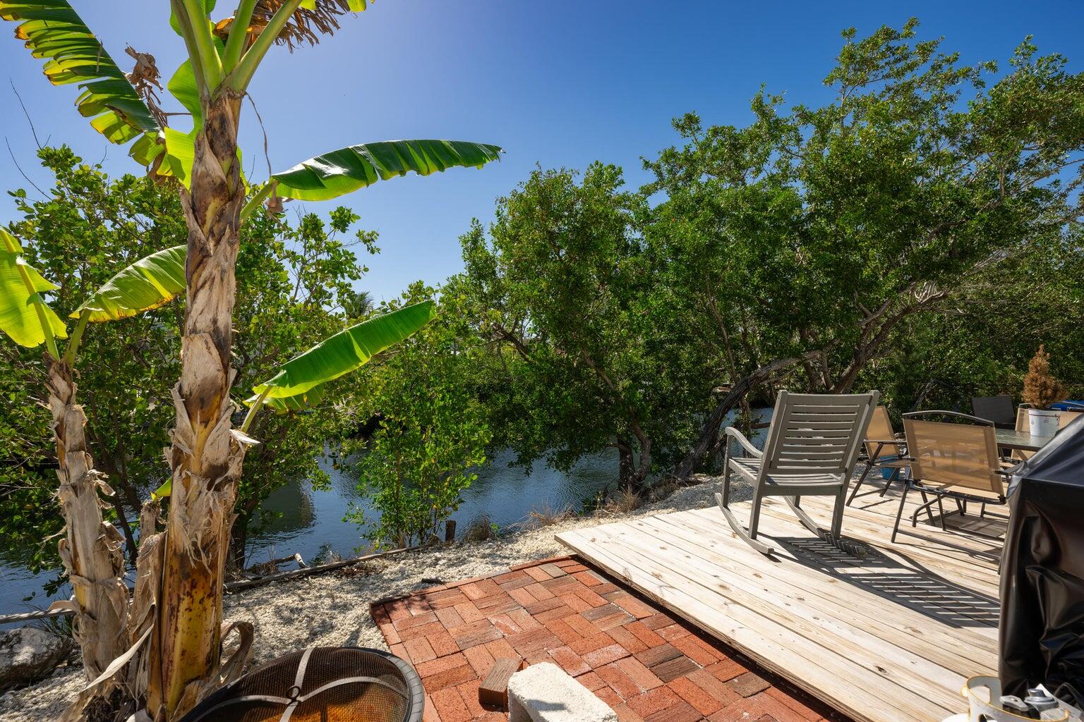 27942 Snapper Lane Summerland Key, FL 33042 - Photo 5 of 26 a view of a terrace with furniture