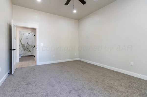 an empty room with a bathroom