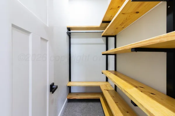 a bathroom with a tub and shower
