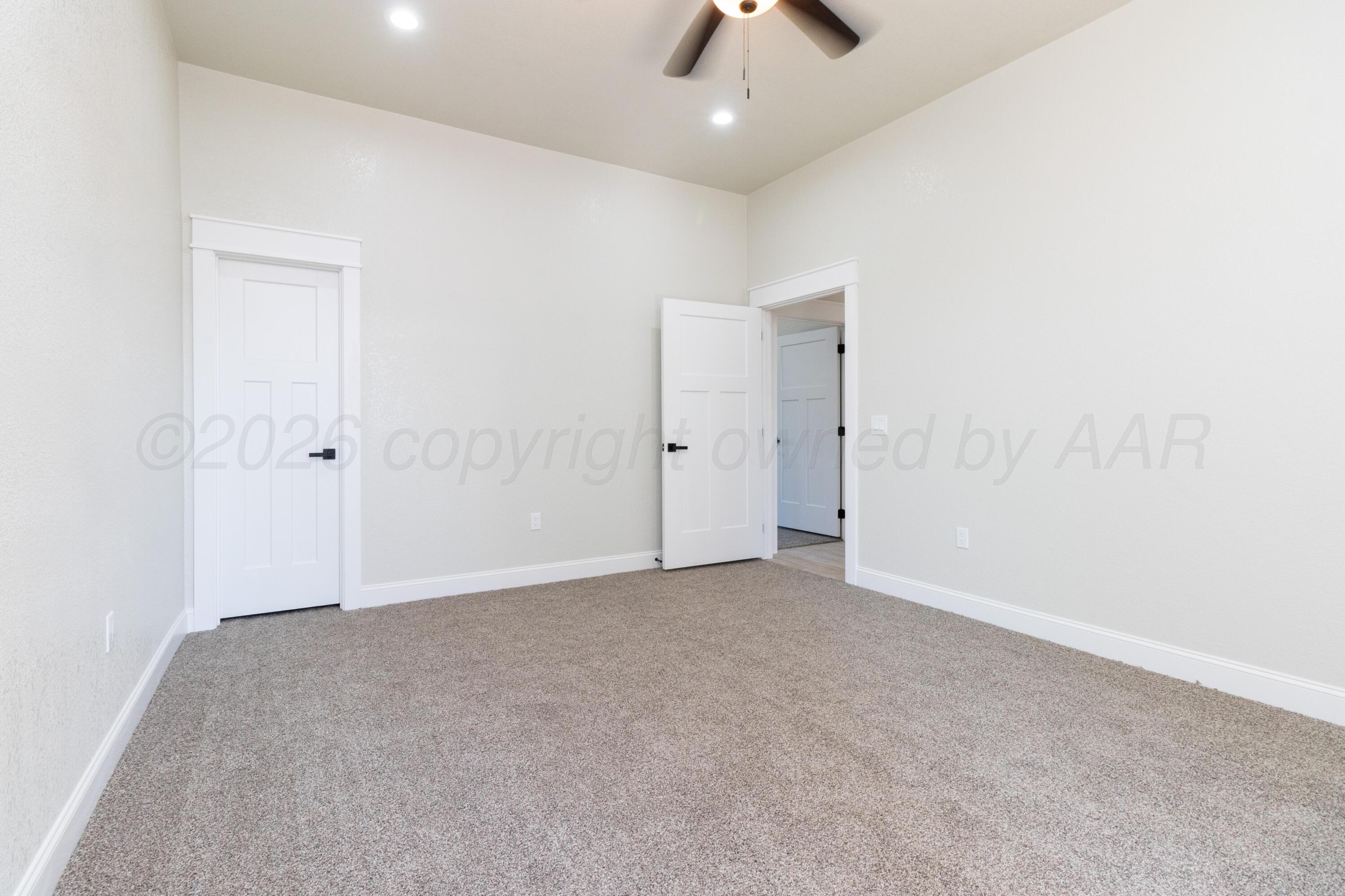 810 South Houston Street Shamrock, TX 79079 - Photo 18 of 42 an empty room with an entryway