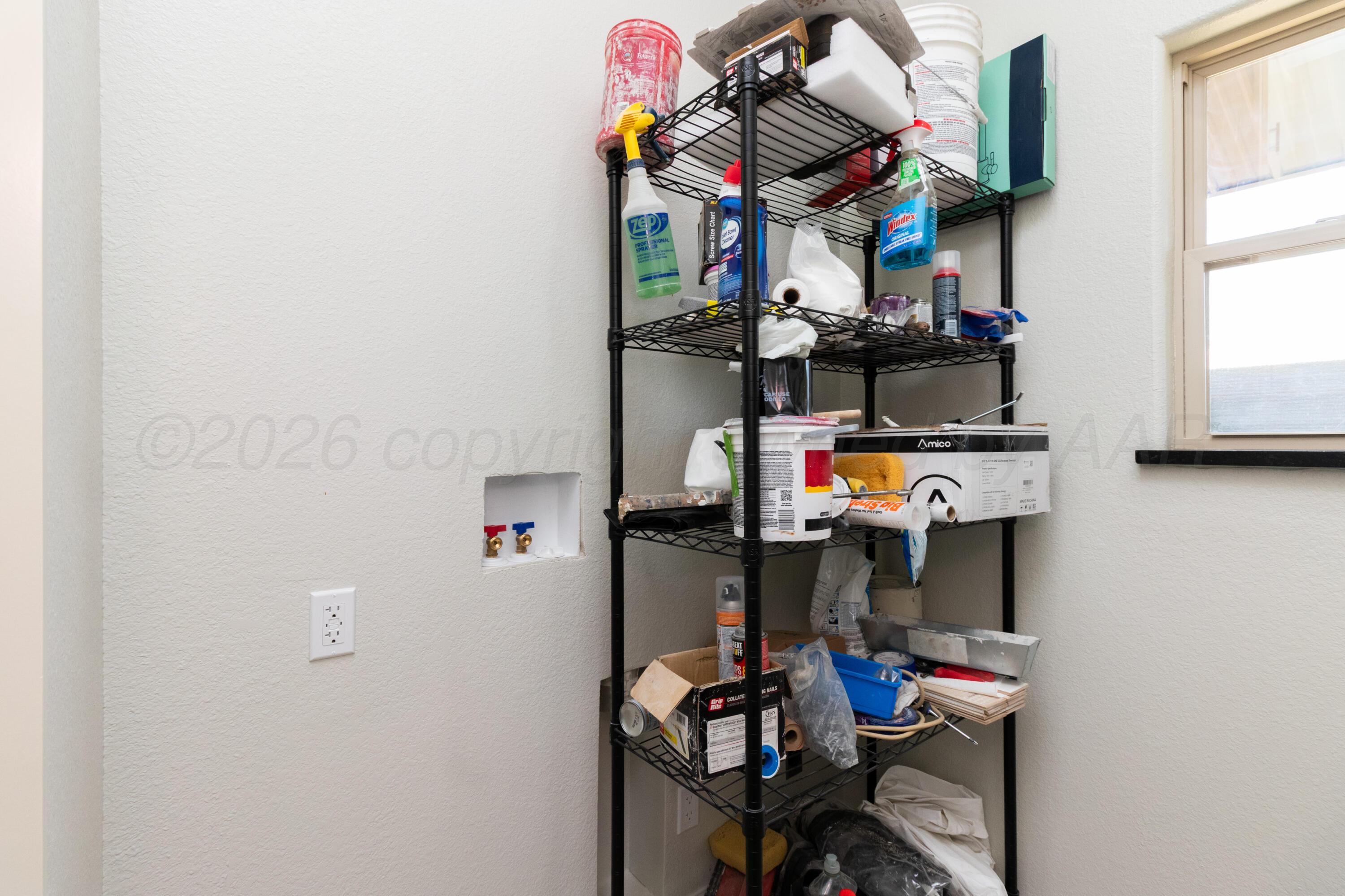 810 South Houston Street Shamrock, TX 79079 - Photo 30 of 42 a room with storage and utility