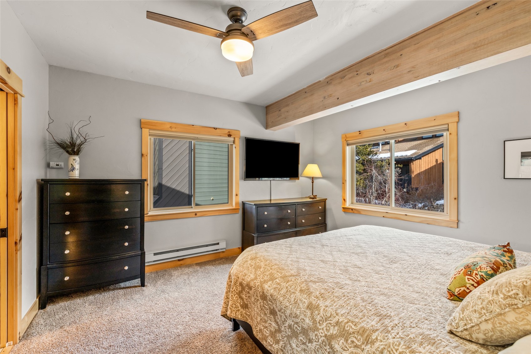 2650 Medicine Springs Road, Unit 11 Steamboat Springs, CO 80487 - Photo 17 of 40 a bedroom with a bed and a television