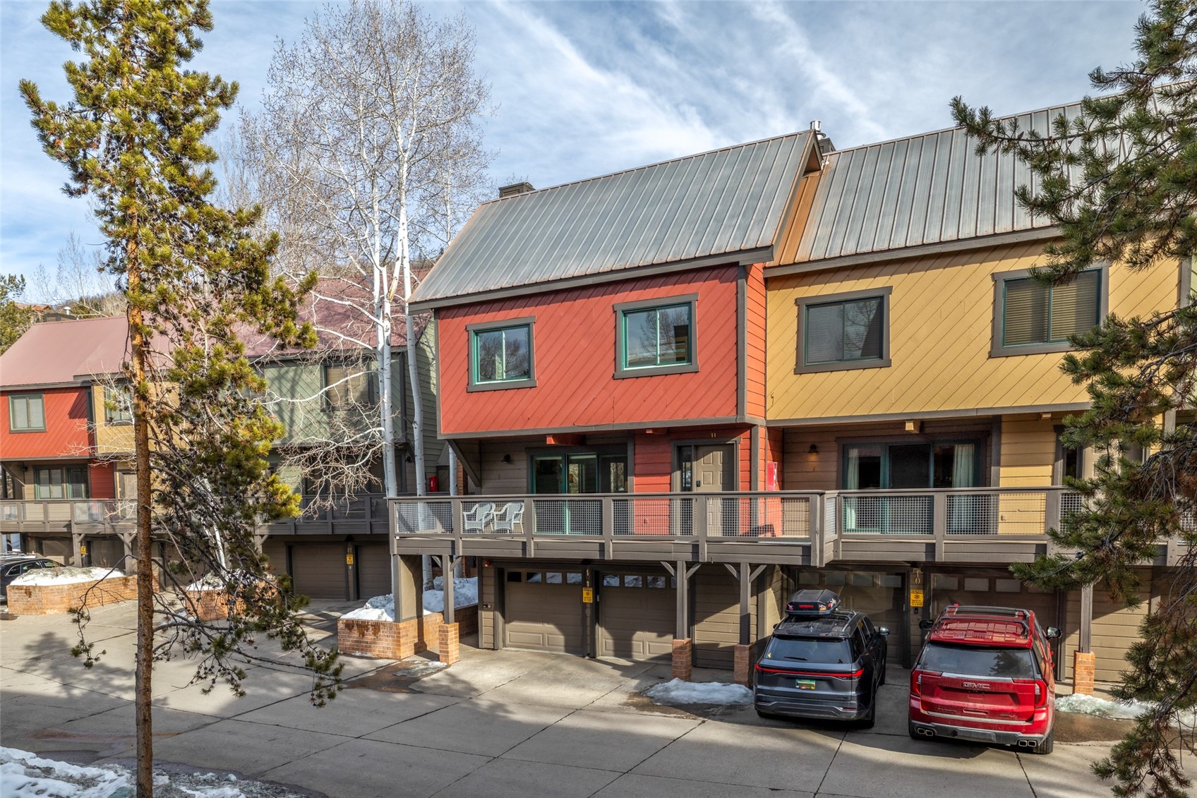 2650 Medicine Springs Road, Unit 11 Steamboat Springs, CO 80487 - Photo 37 of 40 a front view of multiple houses with yard