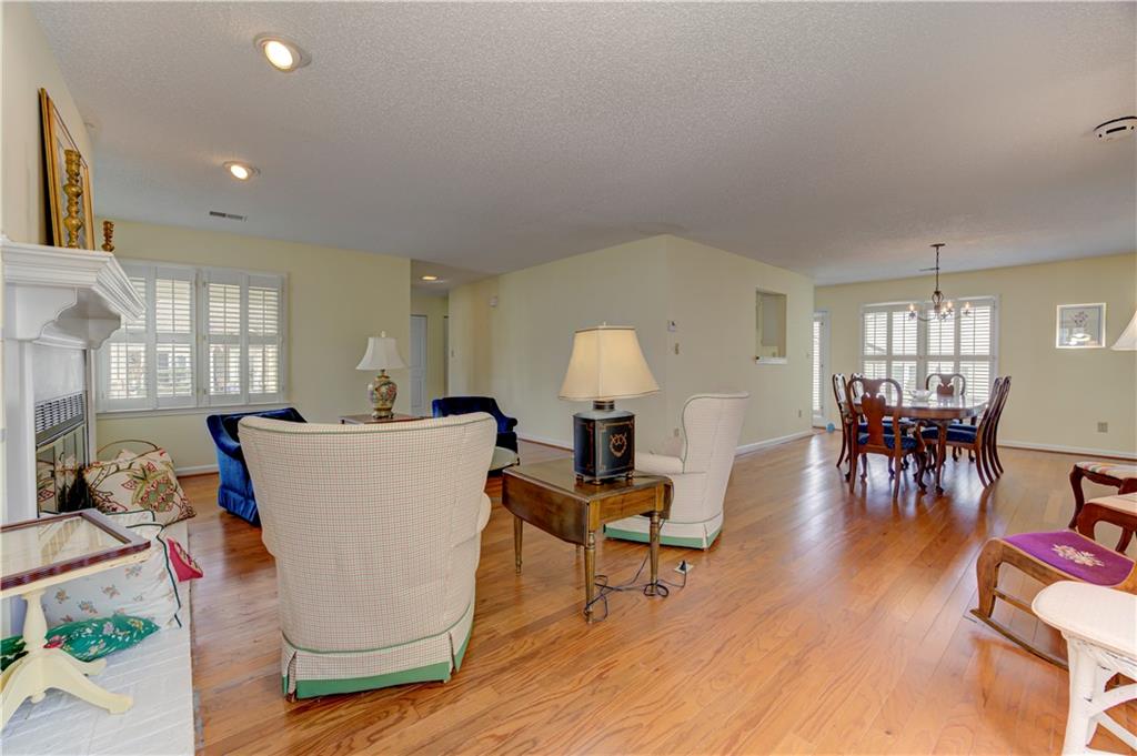 94 Robyn Way Marietta, GA 30062 - Photo 12 of 40 a living room with furniture and wooden floor