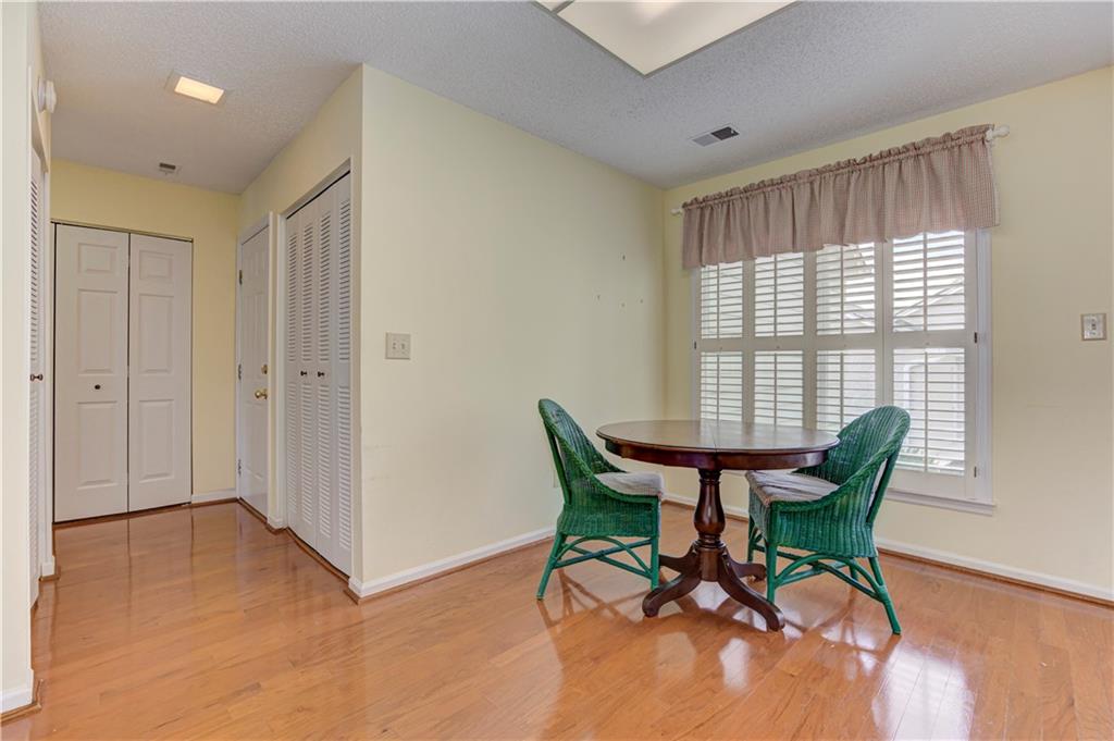 94 Robyn Way Marietta, GA 30062 - Photo 16 of 40 a view of a dining room with furniture window and outside view